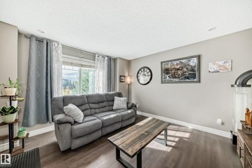63 3625 144 Avenue Nw, Edmonton, AB - Indoor Photo Showing Living Room