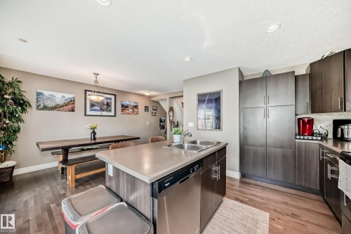 63 3625 144 Avenue Nw, Edmonton, AB - Indoor Photo Showing Kitchen With Double Sink