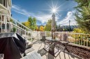 Outdoor patio with a white railing and stairs, featuring a concrete surface - 63 3625 144 Avenue Nw, Edmonton, AB  - Outdoor With Exterior 