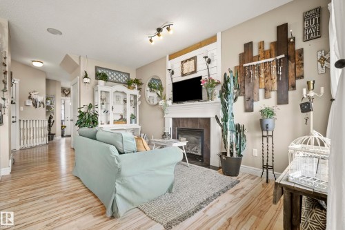 114 Mclaughlin Drive, Spruce Grove, AB - Indoor Photo Showing Living Room With Fireplace