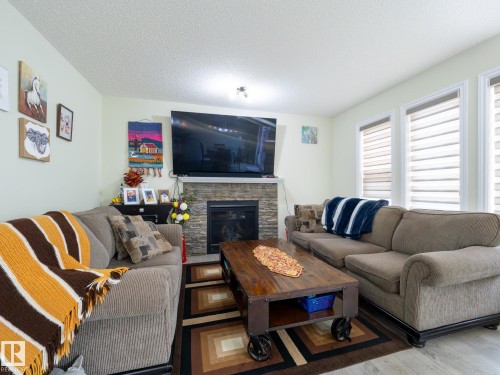 3444 Weidle Way, Edmonton, AB - Indoor Photo Showing Living Room With Fireplace