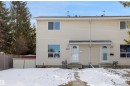 The property features a light-colored exterior with white trim windows and doors - 18297 74 Avenue, Edmonton, AB  - Outdoor 