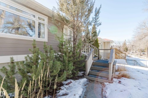 The property features exterior siding, white trim, and white window frames - 10643 66 Avenue, Edmonton, AB - Outdoor