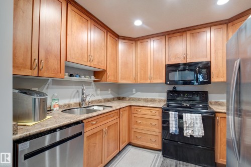 406 12110 106 Avenue, Edmonton, AB - Indoor Photo Showing Kitchen With Double Sink