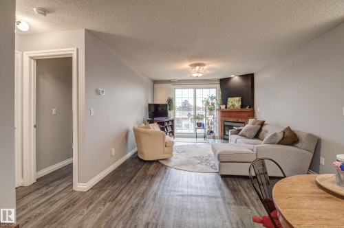 406 12110 106 Avenue, Edmonton, AB - Indoor Photo Showing Living Room
