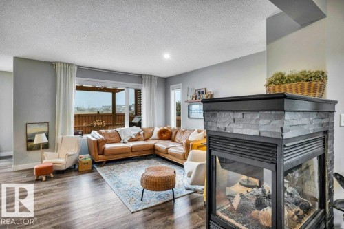 4337 Mcmullen Way, Edmonton, AB - Indoor Photo Showing Living Room With Fireplace