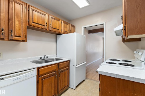 10405 24 Avenue Nw, Edmonton, AB - Indoor Photo Showing Kitchen With Double Sink
