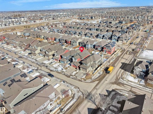 Aerial view of the property and its surrounding residential area, featuring an array of detached homes with varied rooflines - 4405 Crabapple Landing Landing, Edmonton, AB - Outdoor With View