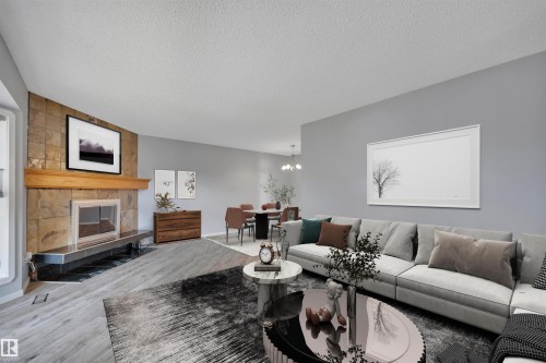 4202 42 Avenue, Leduc, AB - Indoor Photo Showing Living Room With Fireplace