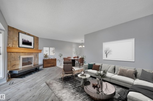 4202 42 Avenue, Leduc, AB - Indoor Photo Showing Living Room With Fireplace