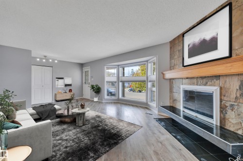4202 42 Avenue, Leduc, AB - Indoor Photo Showing Living Room With Fireplace