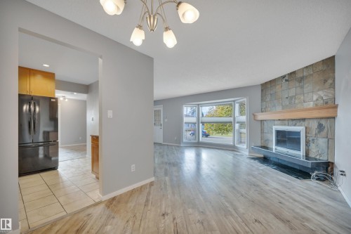 4202 42 Avenue, Leduc, AB - Indoor Photo Showing Living Room With Fireplace