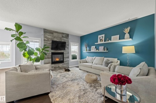 1564 Chapman Way, Edmonton, AB - Indoor Photo Showing Living Room With Fireplace