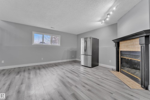 3623 24 Avenue, Edmonton, AB - Indoor With Fireplace