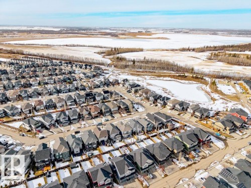 Aerial view of the neighborhood showcasing numerous properties with varied exteriors and rooflines - 13024 206 Street, Edmonton, AB - Outdoor With View
