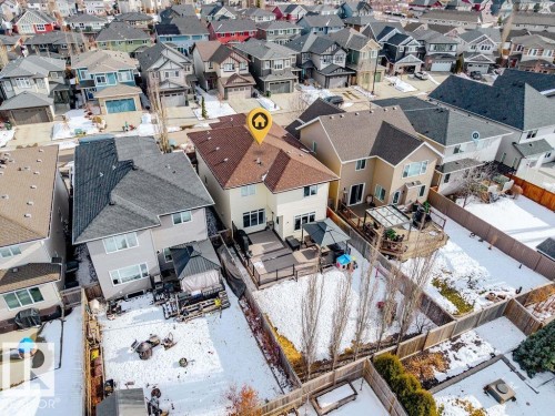 The property features a spacious backyard with a deck, a gazebo, and a fenced perimeter - 13024 206 Street, Edmonton, AB - Outdoor