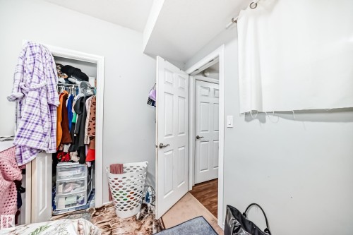 This room features light grey walls and white trim - 2 12042 101 Street, Edmonton, AB - Indoor