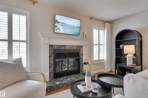 14015 104 Avenue, Edmonton, AB - Indoor Photo Showing Living Room With Fireplace