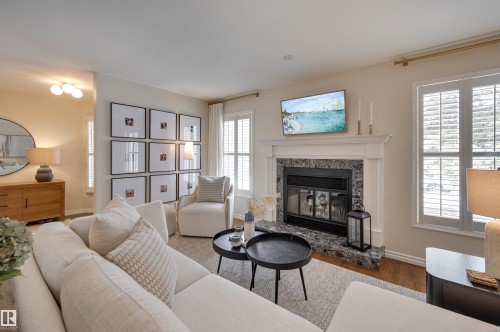 14015 104 Avenue, Edmonton, AB - Indoor Photo Showing Living Room With Fireplace