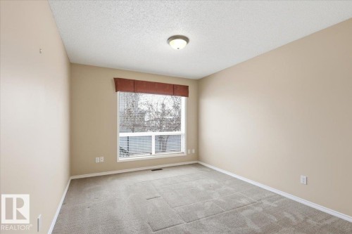 4 102 Bridgeport Crossing, Leduc, AB - Indoor Photo Showing Other Room