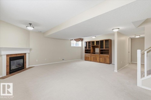 4 102 Bridgeport Crossing, Leduc, AB - Indoor With Fireplace