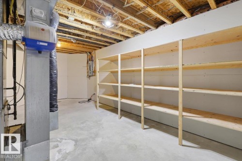 4 102 Bridgeport Crossing, Leduc, AB - Indoor Photo Showing Basement