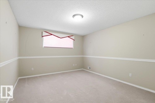 4 102 Bridgeport Crossing, Leduc, AB - Indoor Photo Showing Other Room