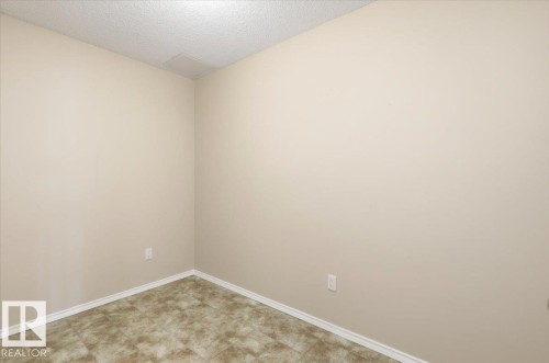 4 102 Bridgeport Crossing, Leduc, AB - Indoor Photo Showing Other Room