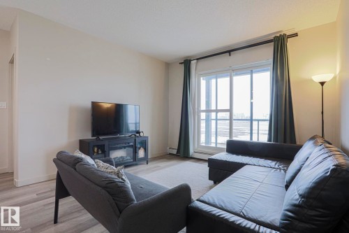 212 320 Ambleside Link, Edmonton, AB - Indoor Photo Showing Living Room