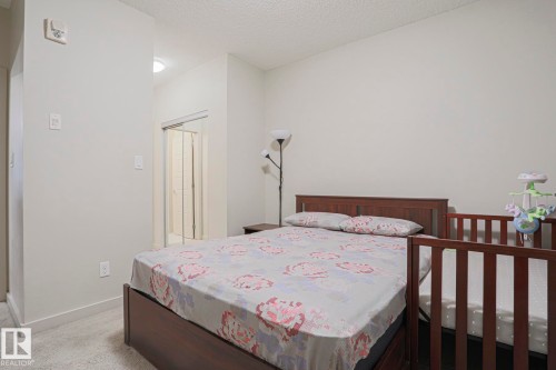 212 320 Ambleside Link, Edmonton, AB - Indoor Photo Showing Bedroom