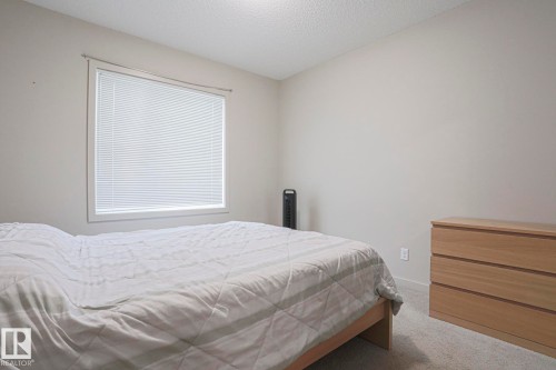 212 320 Ambleside Link, Edmonton, AB - Indoor Photo Showing Bedroom