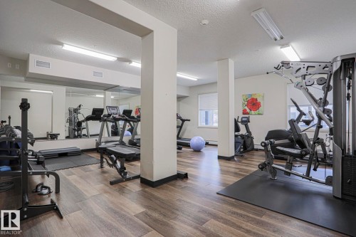 212 320 Ambleside Link, Edmonton, AB - Indoor Photo Showing Gym Room