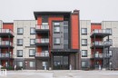 212 320 Ambleside Link, Edmonton, AB  - Outdoor With Balcony With Facade 