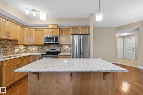 408 10530 56 Avenue, Edmonton, AB - Indoor Photo Showing Kitchen With Stainless Steel Kitchen With Upgraded Kitchen