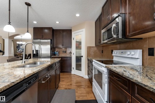 729 37A Avenue, Edmonton, AB - Indoor Photo Showing Kitchen With Double Sink