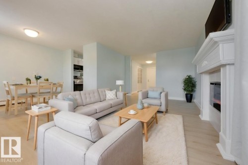 309 14811 51 Avenue, Edmonton, AB - Indoor Photo Showing Living Room