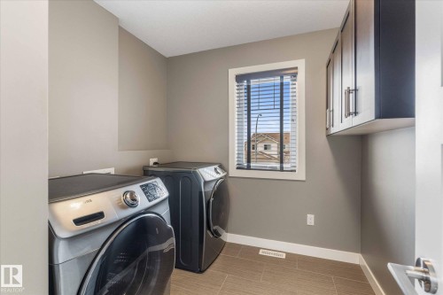 64 Hilldowns Drive, Spruce Grove, AB - Indoor Photo Showing Laundry Room