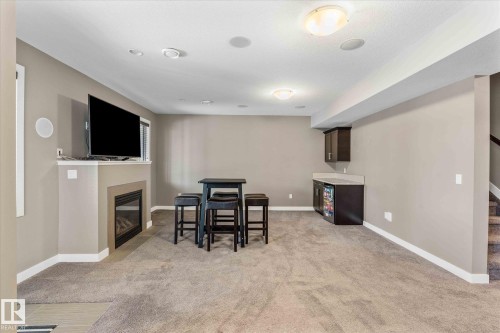 64 Hilldowns Drive, Spruce Grove, AB - Indoor With Fireplace