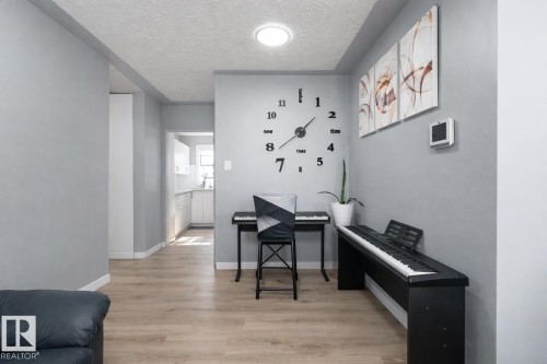 The property features light-colored flooring and light grey walls throughout - 16131 109 Avenue, Edmonton, AB - Indoor