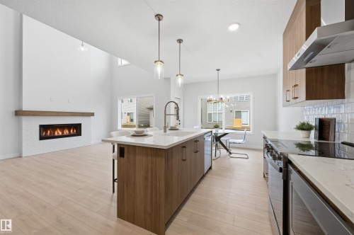 3230 Dixon Way, Edmonton, AB - Indoor Photo Showing Kitchen With Fireplace With Upgraded Kitchen