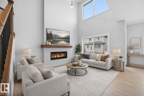 Virtually staged - 3230 Dixon Way, Edmonton, AB - Indoor Photo Showing Living Room With Fireplace