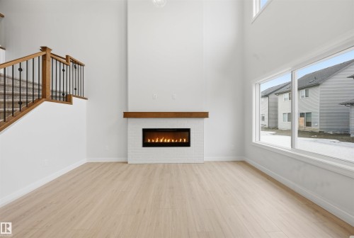 3230 Dixon Way, Edmonton, AB - Indoor With Fireplace