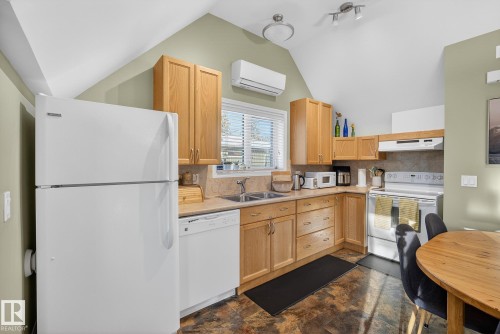 9302 93 Street, Edmonton, AB - Indoor Photo Showing Kitchen With Double Sink