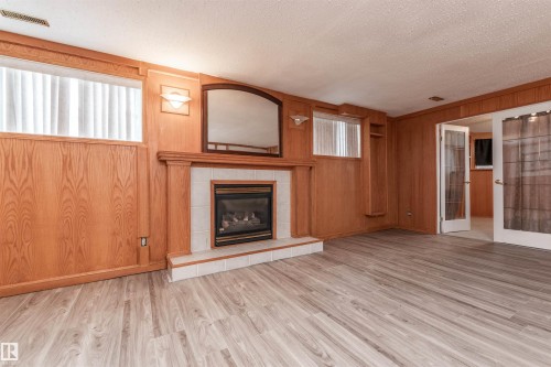 5938 162B Avenue, Edmonton, AB - Indoor Photo Showing Living Room With Fireplace