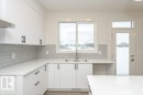 2420 Egret Loop, Edmonton, AB  - Indoor Photo Showing Kitchen With Double Sink 