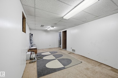 Space for possible home office, rec room or extra storage. - 221 Callingwood Place, Edmonton, AB - Indoor Photo Showing Other Room