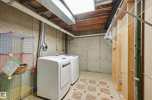 Includes newer washer and dryer - 221 Callingwood Place, Edmonton, AB - Indoor Photo Showing Laundry Room