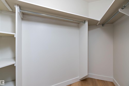 Primary bedroom walk-in closet - 1405 10149 Saskatchewan Drive, Edmonton, AB - Indoor