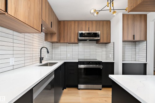 1405 10149 Saskatchewan Drive, Edmonton, AB - Indoor Photo Showing Kitchen With Upgraded Kitchen