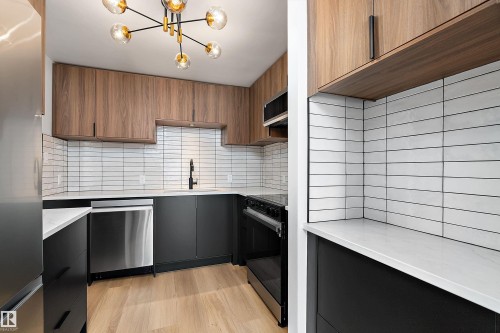 1405 10149 Saskatchewan Drive, Edmonton, AB - Indoor Photo Showing Kitchen With Stainless Steel Kitchen With Upgraded Kitchen